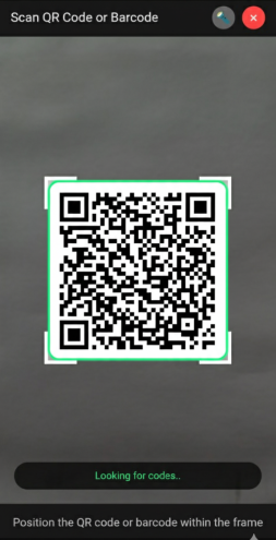 qr_code_inside_scanning_window_using_camera.png